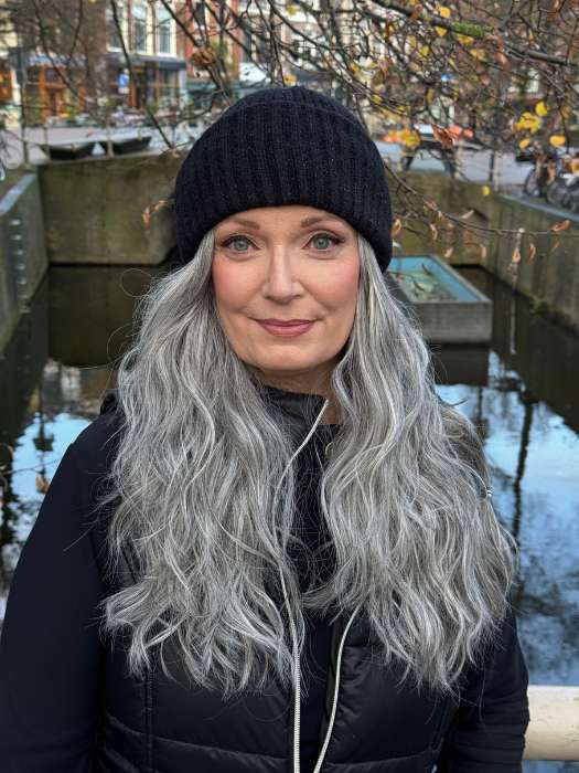 Mel B. @mels.be.ageless wearing BROOKLYN by RENE OF PARIS in color SALT-&-PEPPER-MR | A 50/50 Blend of Deep Charcoal Grey and Light Alabaster Grey Tones with a Micro Root