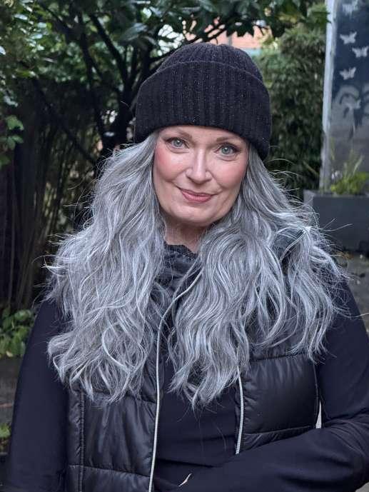 Mel B. @mels.be.ageless wearing BROOKLYN by RENE OF PARIS in color SALT-&-PEPPER-MR | A 50/50 Blend of Deep Charcoal Grey and Light Alabaster Grey Tones with a Micro Root