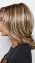 A mid length synthetic wig