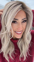 Nichole Corbett @nicholealee wearing MILANO by BELLE TRESS in color MILKSHAKE BLONDE R | A mixture of Light Sandy Brown, Highlighted with Light Ash Blonde with a Hint of Light Platinum Blonde with a Medium Root Color