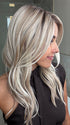 Lorena @faux.hurr.lifee wearing MILANO by BELLE TRESS in color MILKSHAKE BLONDE R | A mixture of Light Sandy Brown, Highlighted with Light Ash Blonde with a Hint of Light Platinum Blonde with a Medium Root Color