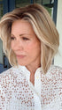 Shannon @shannonwigsout is wearing MIRA by AMORE in color SEA SALT BLOND R | A perfect mixture of cool, icy-blond and warm-dark blond. The rich brown root tone enhances the modern appearance.
