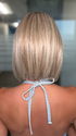 Roxie is wearing MISS COMFORT by ELLEN WILLE in PEARL BLONDE ROOTED 101.24.20 | Pearl Platinum, Lightest Ash Blonde and Light Strawberry Blonde Blend with Dark Shaded RootsShaded Roots