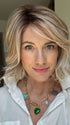 Jenny B. @thewiggygirl wearing NEWPORT by BELLETRESS in color MILKSHAKE BLONDE R | A mixture of Light Sandy Brown, Highlighted with Light Ash Blonde with a Hint of Light Platinum Blonde with a Medium Root Color