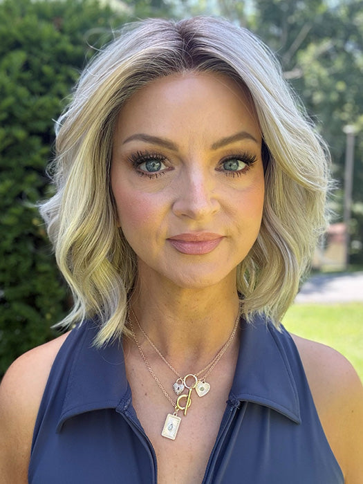 Sandy @i_be_wiggin wearing OLIVIA by BELLE TRESS in color BISCOTTI CREME R | A soft, dimensional blonde shade that blends warm, golden-beige tones with light, creamy highlights for a sunlit, natural look.