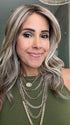 Lorena @faux.hurr.lifee wearing OXFORD by BELLE TRESS in color MACADAMIA LATTE R | A combination of Medium and Light Brown, highlighted with Light Gold Blonde, and a mixture of Ash Blonde and Light Gold Blonde, Rooted with Medium and Light Brown