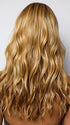 Model is wearing POSH WAVEZ in Bronzed Honey-R  | A perfect blend of rich, warm golden blond and medium chocolate brown tones, complemented by a dark chocolate root that adds a luxurious, dimensional effect.