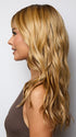 Model is wearing POSH WAVEZ in Bronzed Honey-R  | A perfect blend of rich, warm golden blond and medium chocolate brown tones, complemented by a dark chocolate root that adds a luxurious, dimensional effect.