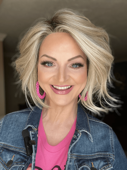 Sandy @i_be_wiggin wearing TREND ALERT by GABOR in color GF19-23SS BISCUIT | Light Ash Blonde Evenly Blended with Cool Platinum Blonde with Dark Roots. PPC MAIN IMAGE