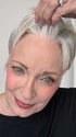 Mel B. @mels.be.ageless wearing PIXIE TP by AMORE in color SILVER-STONE | Dark Brown Base with Multi Grey Shades Blended