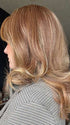 Carly @carlynwilson84 wearing CURVE APPEAL by RAQUEL WELCH WIGS in color RL29/25 GOLDEN RUSSET | Ginger Blonde Evenly Blended with Medium Golden Blonde
