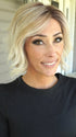 Nichole wearing LOS ANGELES by BELLETRESS in MILKSHAKE BLONDE R | A mixture of Light Sandy Brown, Highlighted with Light Ash Blonde with a Hint of Light Platinum Blonde with a Medium Root Color