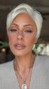 Roxie wearing CELINE by JON RENAU in 60 WINTER SUN | Pure White