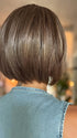 Roxie wearing DUA by ELLEN WILLE in CHOCOLATE FROSTED | Warm, luxurious, and full of depth —this shade is perfect for a multi -dimensional, polished finish.