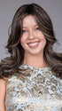 Model is wearing ROBERTS TRUFFLE CREAM-R  | in color A chocolate truffle-inspired medium brown base with creamy light blonde highlights and dark roots, creating a balanced, multidimensional brunette.