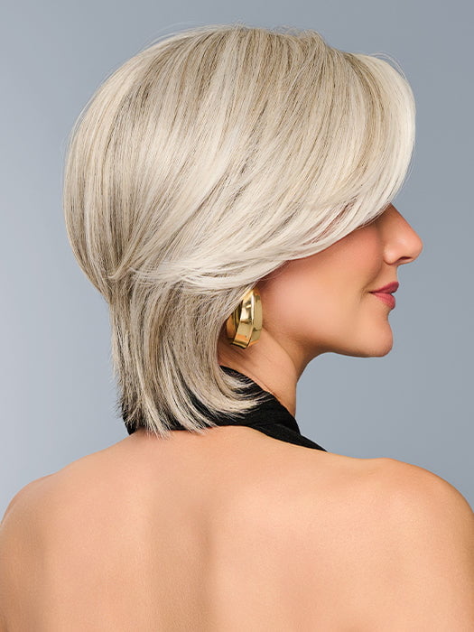 Model is wearing TAILORED ALLURE in color L51/61 ICED GRANITA | Lightest Grey Progresses to a Deep Grey at the Nape