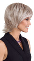 Model is wearing RAZOR CUT SHAG by TRESSALLURE in color 56/60/R8 | Lightest Grey Blend Rooted Medium Brown