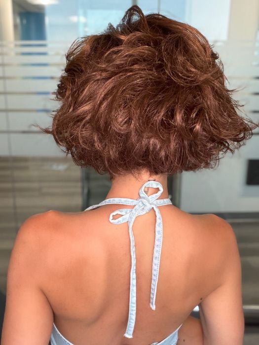 Roxie is wearing ROMANCE DELUXE by ELLEN WILLE in CINNAMON BROWN ROOTED 33.30.6 | Dark Auburn, Light Auburn and Dark Brown Blend with Shaded Roots