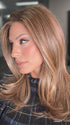 Roxie is wearing CHARMING by TRESSALLURE in color 17/23/R8 | Beige Blonde and Auburn Blended with Medium Brown Roots