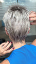 Model is wearing CHAT by ELLEN WILLE in color PEARL ROOTED | Pearl Platinum with Medium Ash Blonde and Lightest Brown with Grey Blend and Shaded Roots