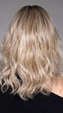 Model is wearing SIMONE in color BUTTERBEER R | Dark Brown Base and Root that transitions smoothly into a buttery blonde, infused with creamy honey and toffee tones