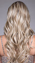 Model is wearing SOPHIA by BELLETRESS in color BUTTERBEER R | Dark Brown Base and Root that transitions smoothly into a buttery blonde, infused with creamy honey and toffee tones