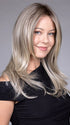 Model is wearing SPEARS in COOL CHAI BLONDE-R | A balanced cool blonde with softly contrasted darker roots, a fresh twist on classic blonde tones.