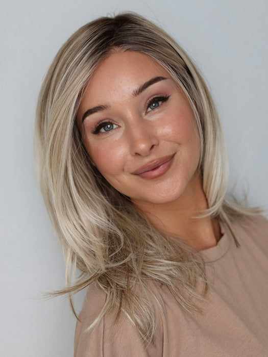 Heather @cjswigs wearing SEVILLE by BELLE TRESS in color MILKSHAKE BLONDE R | A mixture of Light Sandy Brown, Highlighted with Light Ash Blonde with a Hint of Light Platinum Blonde with a Medium Root Color