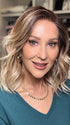 Eileen @crazywiglady is wearing SMOOTH WAVEZ by RENE OF PARIS in color MELTED-MARSHMALLOW | Subtly warm dark sandy blonde blend with medium brown roots and light ash blonde tips and highlights