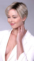 Model is wearing SOHO in CRUSHED ALMOND BLONDE R | A soft Neutral Light Blonde with a Light and Medium Blended Root Color
