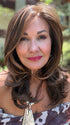 Ellen @agingwithellen is wearing BROOKLYN by BELLE TRESS in color MOCHA MAPLE BROWN | A mix of Dark Brown, Medium Brown, Light Auburn, Medium Strawberry