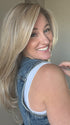 Carlyn @carlynwilson84 wearing SPEARS by BELLE TRESS in color BUTTERCAKE BLONDE-R | A neutral-warm blonde blend featuring light brown, ash, and lightest blonde tones with natural-looking darker roots for added depth and realism.