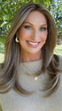Kim Hammon @letstalkwithkim wearing SPEARS by BELLE TRESS in color BROWN SUGAR BLONDE-R | A warm, dimensional blend of medium brown and golden blonde highlights with natural-looking darker roots for depth and a sun-kissed finish.