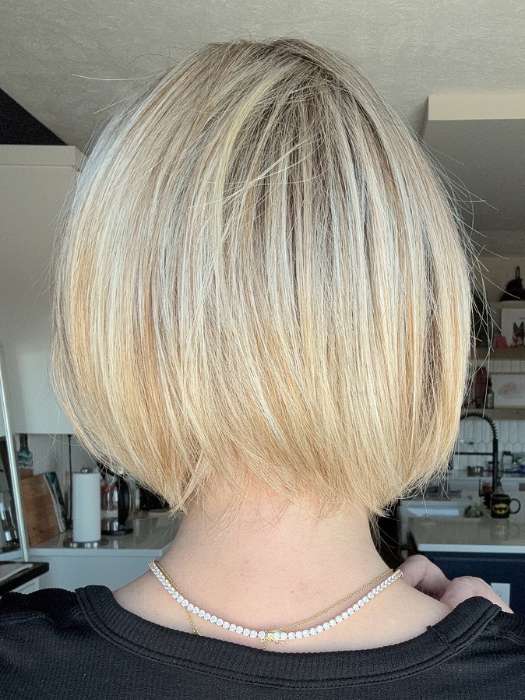 Carly @carlynwilson84 wearing Straight Up With a Twist by Raquel Welch in color SS19/23 SHADED BISCUIT | Cool Platinum blonde with subtle highlights and medium brown roots
