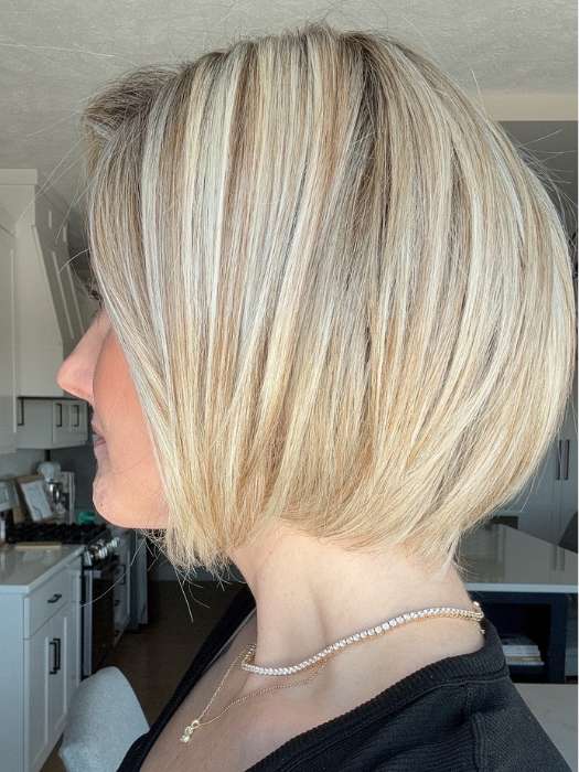 Carly @carlynwilson84 wearing Straight Up With a Twist by Raquel Welch in color SS19/23 SHADED BISCUIT | Cool Platinum blonde with subtle highlights and medium brown roots