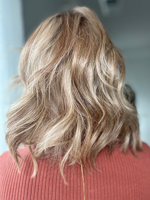 Emily H. @she_sheds_more wearing TERESA by BELLE TRESS in color CARAMEL TOFFEE BLONDE-R | Toffee is a warm, dimensional shade blending medium brown with golden blonde and caramel highlights. Softly rooted for a natural, sun-kissed finish.