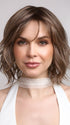 Terra by Amore in color BRONDE-R | Dark brown and natural medium blond tones are mixed together and shaded with medium dark brown roots for a realistic appearance.