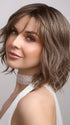 Terra by Amore in color BRONDE-R | Dark brown and natural medium blond tones are mixed together and shaded with medium dark brown roots for a realistic appearance.