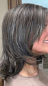 Marcie Mertz @wig.obsessed wearing MIKA by RENE OF PARIS in color TRUFFLE RIBBON R | Off-Black base with Warm Medium Brown and Silver highlights. The Dark Brown Root creates a naturally dimensional appearance.