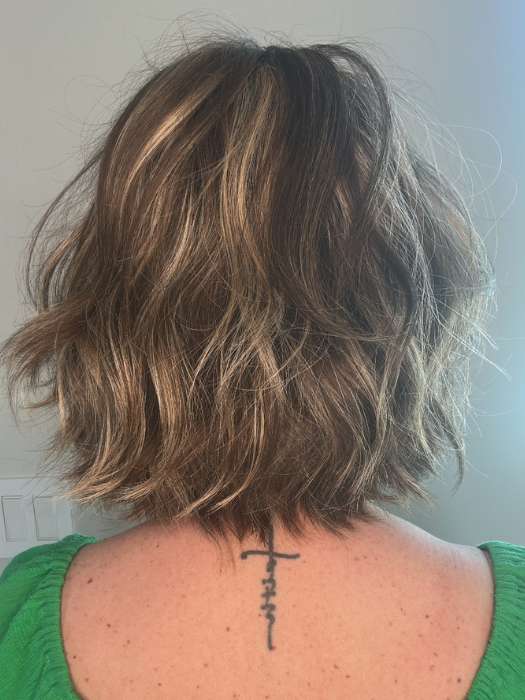 Emily H. @she_sheds_more wearing MISSONI by BelleTress in color TOASTED WALNUT R | Medium Brown Rooted, Ash Brown, Medium Gold Blonde, and Light Brown Blended to perfection