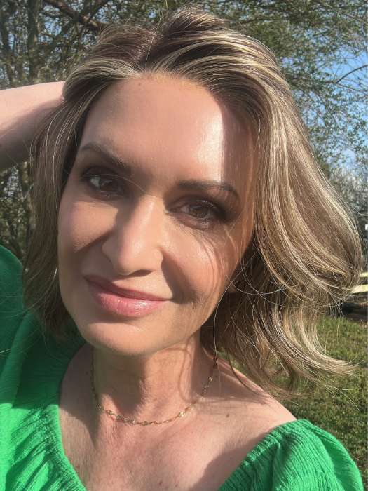 Emily H. @she_sheds_more wearing MISSONI by BelleTress in color TOASTED WALNUT R | Medium Brown Rooted, Ash Brown, Medium Gold Blonde, and Light Brown Blended to perfection