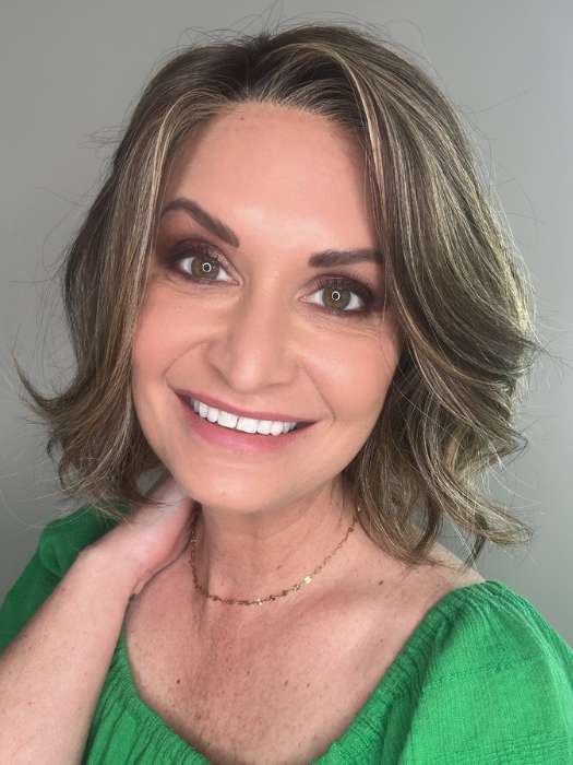 Emily H. @she_sheds_more wearing MISSONI by BelleTress in color TOASTED WALNUT R | Medium Brown Rooted, Ash Brown, Medium Gold Blonde, and Light Brown Blended to perfection