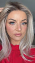 Sandy @i_be_wiggin wearing SEVILLE by BelleTress in color MILKSHAKE BLONDE R | A mixture of Light Sandy Brown, Highlighted with Light Ash Blonde with a Hint of Light Platinum Blonde with a Medium Root Color