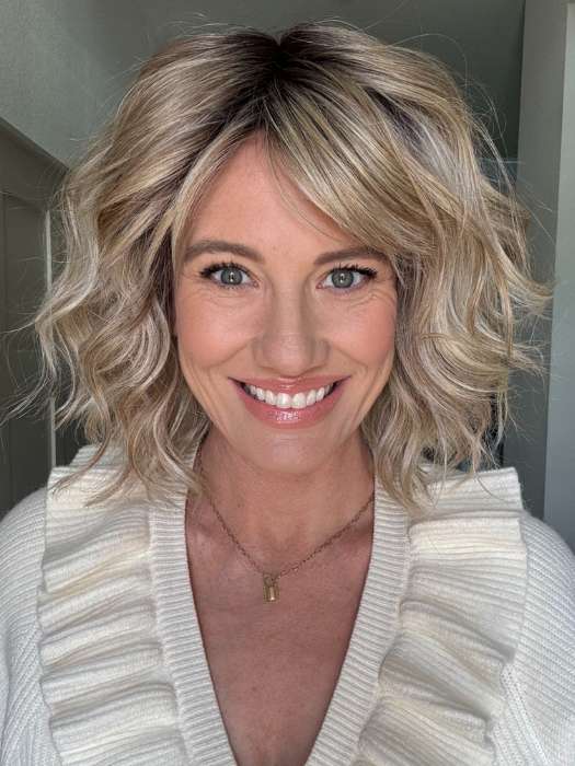 Jenny B. @thewiggygirl wearing CONQUER THE WAVES by GABOR in color SS BISCUIT GF19-23SS BISCUIT | Light Ash Blonde Evenly Blended with Cool Platinum Blonde with Dark Roots