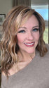 Marcie @wig.obsessed wearing BEACH WAVE MAGIC by TRESSALLURE in color 17/23/R8 | Beige Blonde and Auburn Blended with Medium Brown Roots

