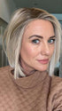Jenny B. @thewiggygirl wearing SANTA MONICA by BELLETRESS in color CRUSHED ALMOND BLONDE R | A soft Neutral Light Blonde with a Light and Medium Blended Root Color.

