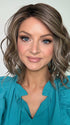 Sandy @i_be_wiggin wearing VERONICA by BELLE TRESS in color BROWN-SUGAR-COOKIE-R | The Roots are a Rich Brown Tone that seamlessly transitions into a Warm Golden Brown