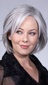 Model is wearing WINTOUR by BELLETRESS in color COCONUT MILK GRAY 39/51/61A | A soft, modern blend of creamy off-white and gentle gray tones, creating a pearlescent, silvery finish.