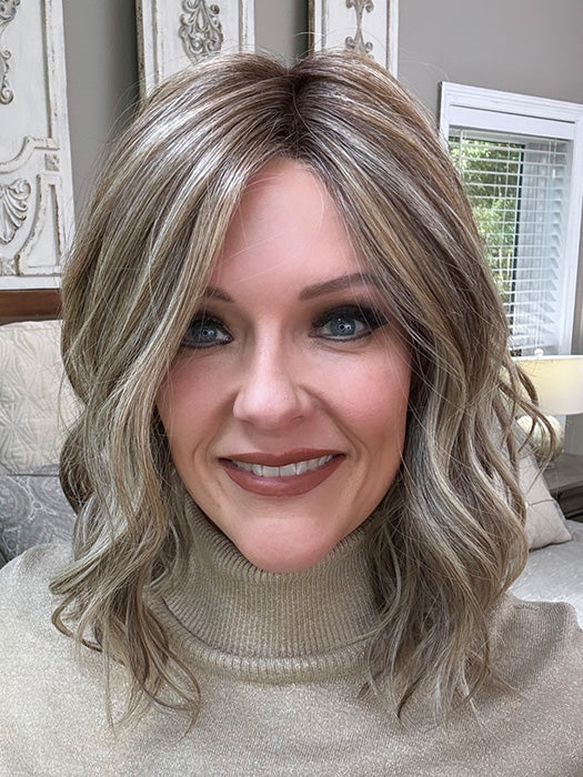 Marcie Mertz @wig.obsessed wearing WAVY DAY by RAQUEL WELCH in color RL12/22SS SHADED CAPPUCCINO | Light Golden Brown Evenly Blended with Cool Platinum Blonde Highlights with Dark Roots