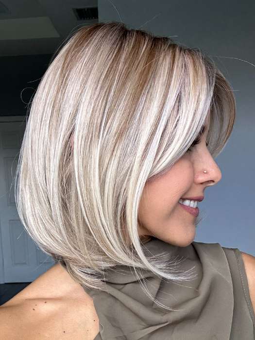 Lorena @faux.hurr.lifee wearing ZARAGOZA by BELLETRESS in color MILKSHAKE BLONDE R | A mixture of Light Sandy Brown, Highlighted with Light Ash Blonde with a Hint of Light Platinum Blonde with a Medium Root Color